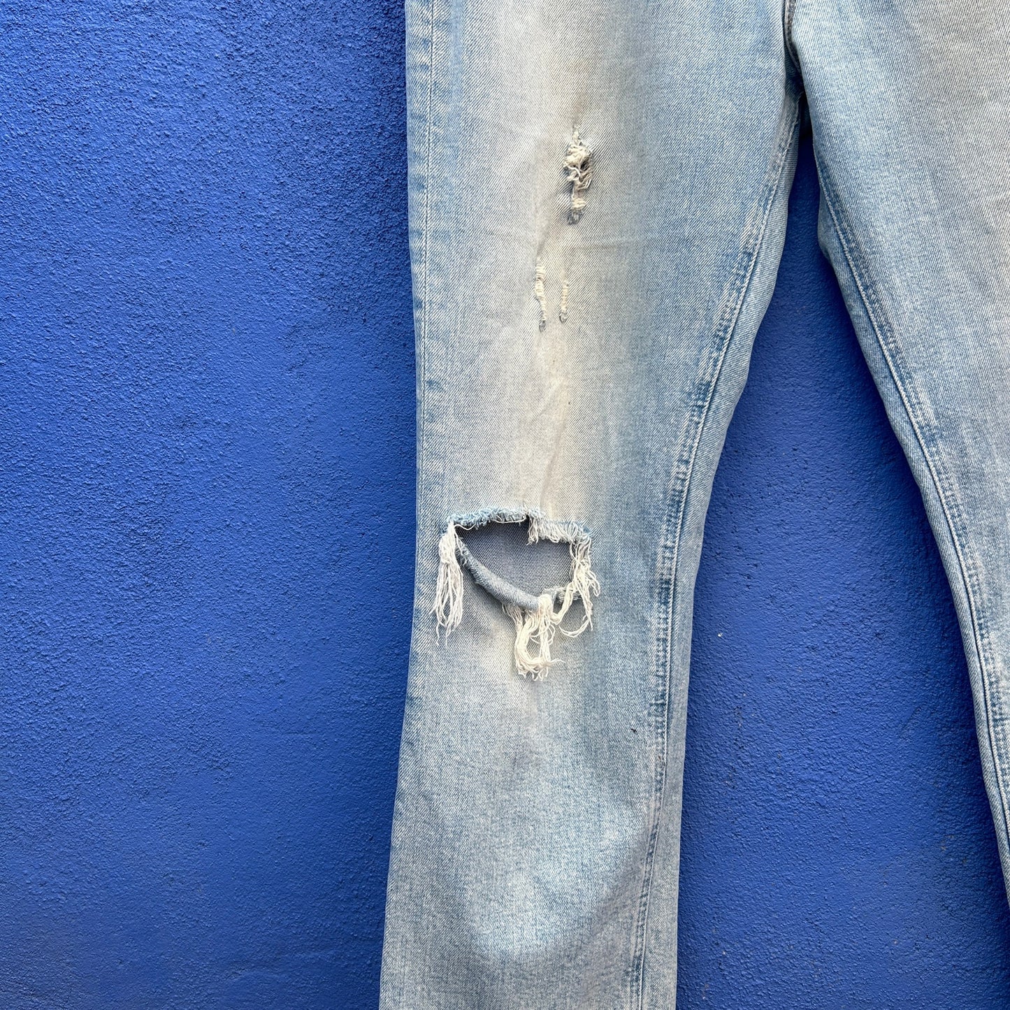 mother the tripper light washed distressed jeans