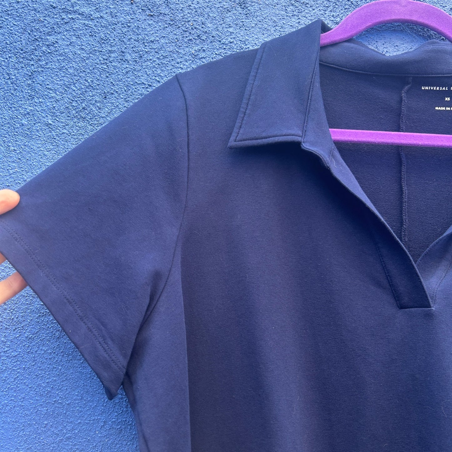 universal standard navy jersey polo