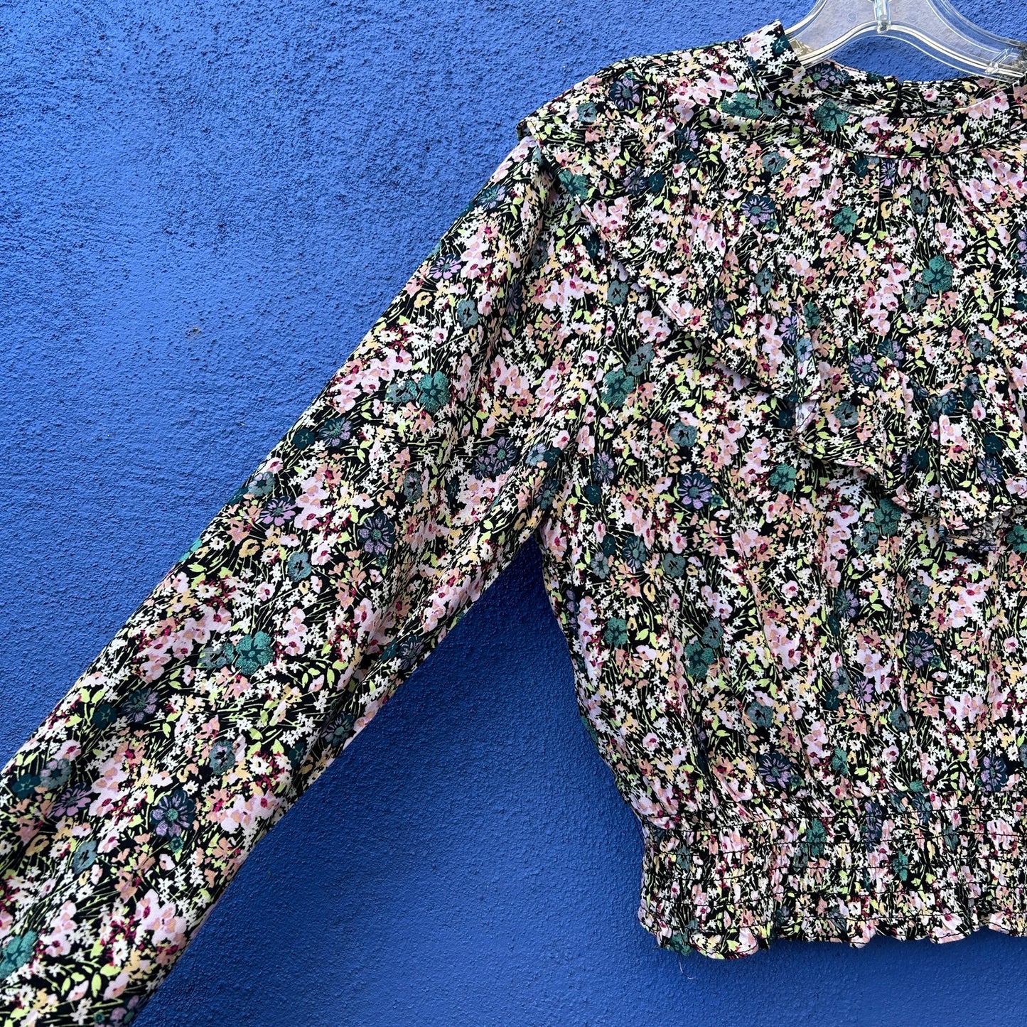 floral print ruched waist top with triangle ruffle detail