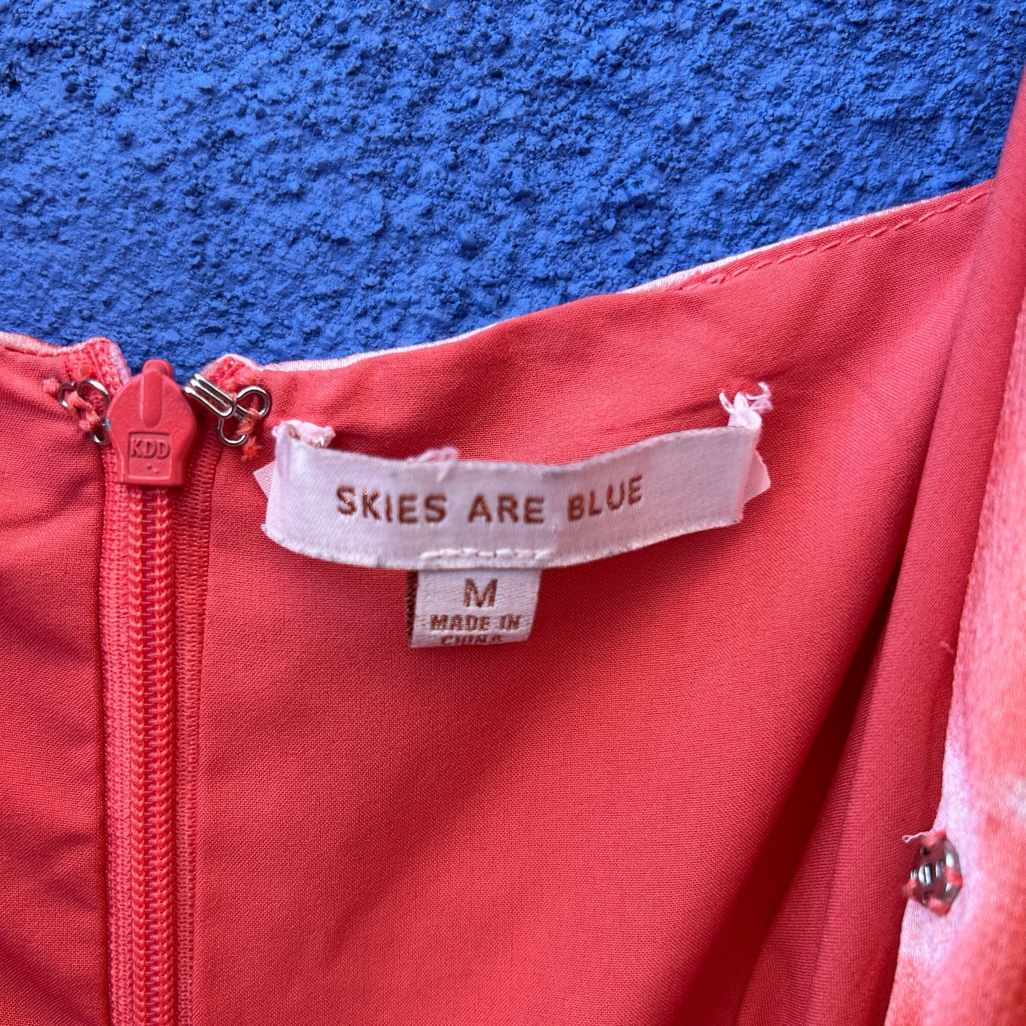 skies are blue surplice jumpsuit